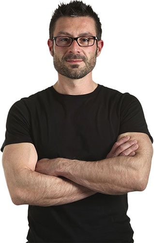 Portrait of digital marketer with arms crossed, focused on ROI for local home service companies.